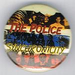 File:Synchronicity Sting yellow Stewart blue Andy red small round button.jpg