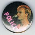 1979 06 UK tour Sting pink POLICE live small round button.jpg
