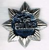 The Police metal badge star.jpg