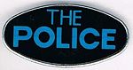 The Police metal badge light blue.jpg