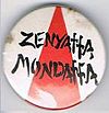 Zenyatta white red triangle button.jpg