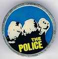 1978 promo photo round metal badge light blue.jpg