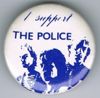 1979 09 Police fin costello white background blue colour large round button.jpg