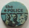 1979 12 the POLICE black point black blue background round button.jpg