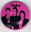 1979 1980 Police pink small round button.jpg