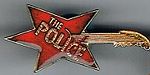 Guitar The Police red metal badge.jpg