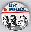 1979 12 the POLICE blue point red round button.jpg