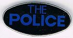 The Police metal badge dark blue.jpg