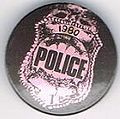 1980 badge black pink button.jpg