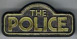 The Police different logo plastic gold.jpg