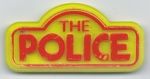 The Police different logo plastic yellow red.jpg