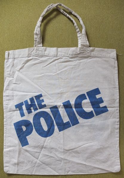File:The Police cloth bag blue on white.jpg