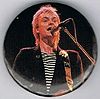 1979 12 Sting live larger round button.jpg