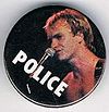 1979 06 UK tour Sting white POLICE live small round button.jpg