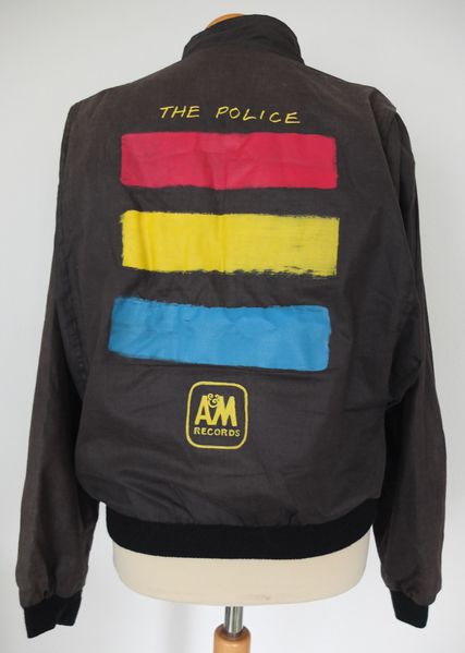 File:Synchronicity jacket private back.jpg