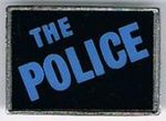 The Police square metal badge light blue logo.jpg