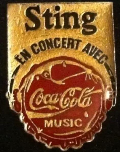 File:1985 ish Sting Coca Cola button.jpg