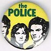1979 08 Police yellow background blue letters round button.jpg