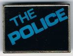 The Police square metal badge Ghost typo.jpg